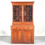 An Edwardian cabinet bookcase