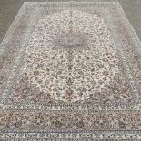 A large Kashan carpet
