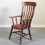 A 20th century splat back armchair
