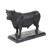 A bronze model of a bull