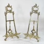 A pair of brass easels