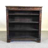 A Victorian carved oak bookcase