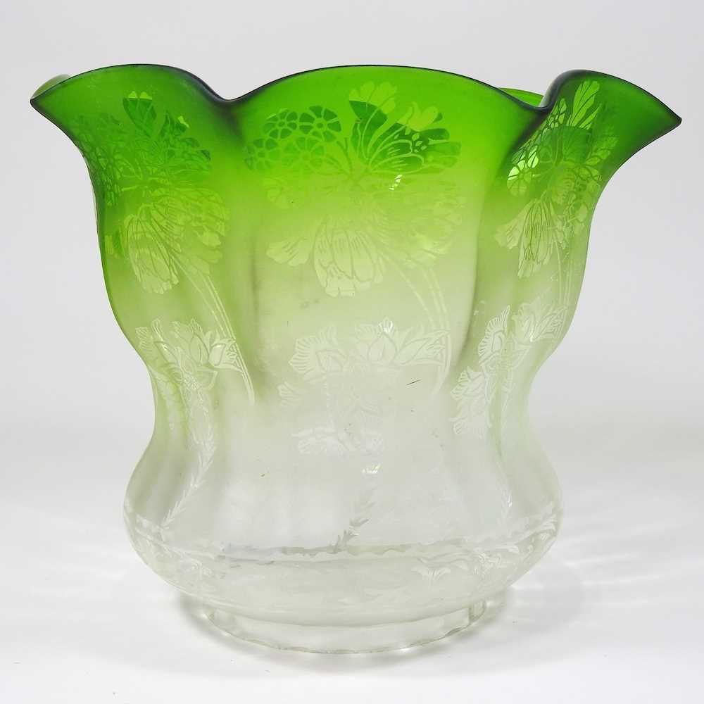 A glass oil lamp shade