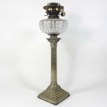 A silver plated oil lamp