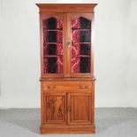 A Victorian cabinet bookcase