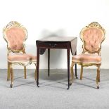 A pair of gilt side chairs