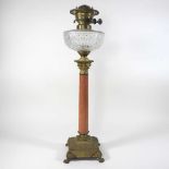 A 19th century marble oil lamp