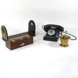 A vintage black bakelite telephone