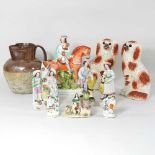 A collection of Staffordshire figures