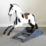 A 19th century style rocking horse