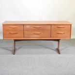 A 1970's teak sideboard