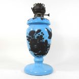 A 19th century blue glass oil lamp
