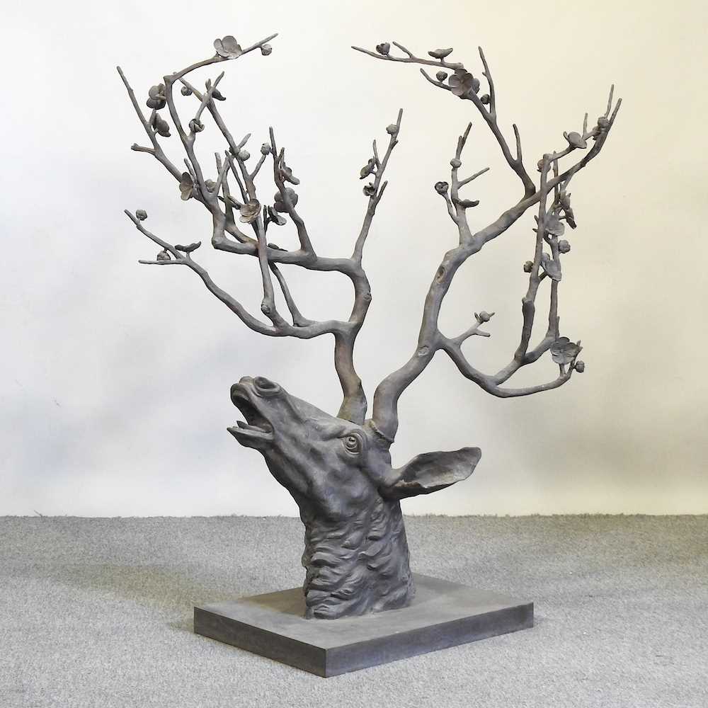 A bronze stag's head sculpture