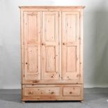 A pine triple wardrobe