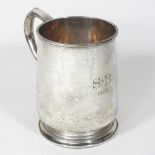 An early 20th century silver mug