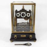 A Congreve rolling ball mantel clock