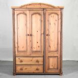 A modern pine triple wardrobe