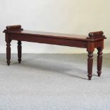 A handmade mahogany window seat