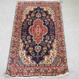 A Persian woollen rug