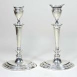 A pair of Edwardian silver candlesticks