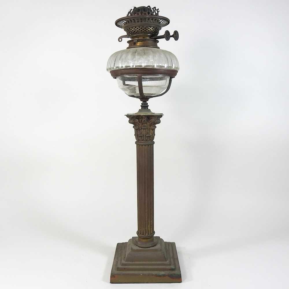 An early 20th century brass oil lamp