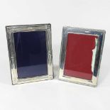 Two silver photograph frames