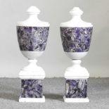 A pair of marble urns