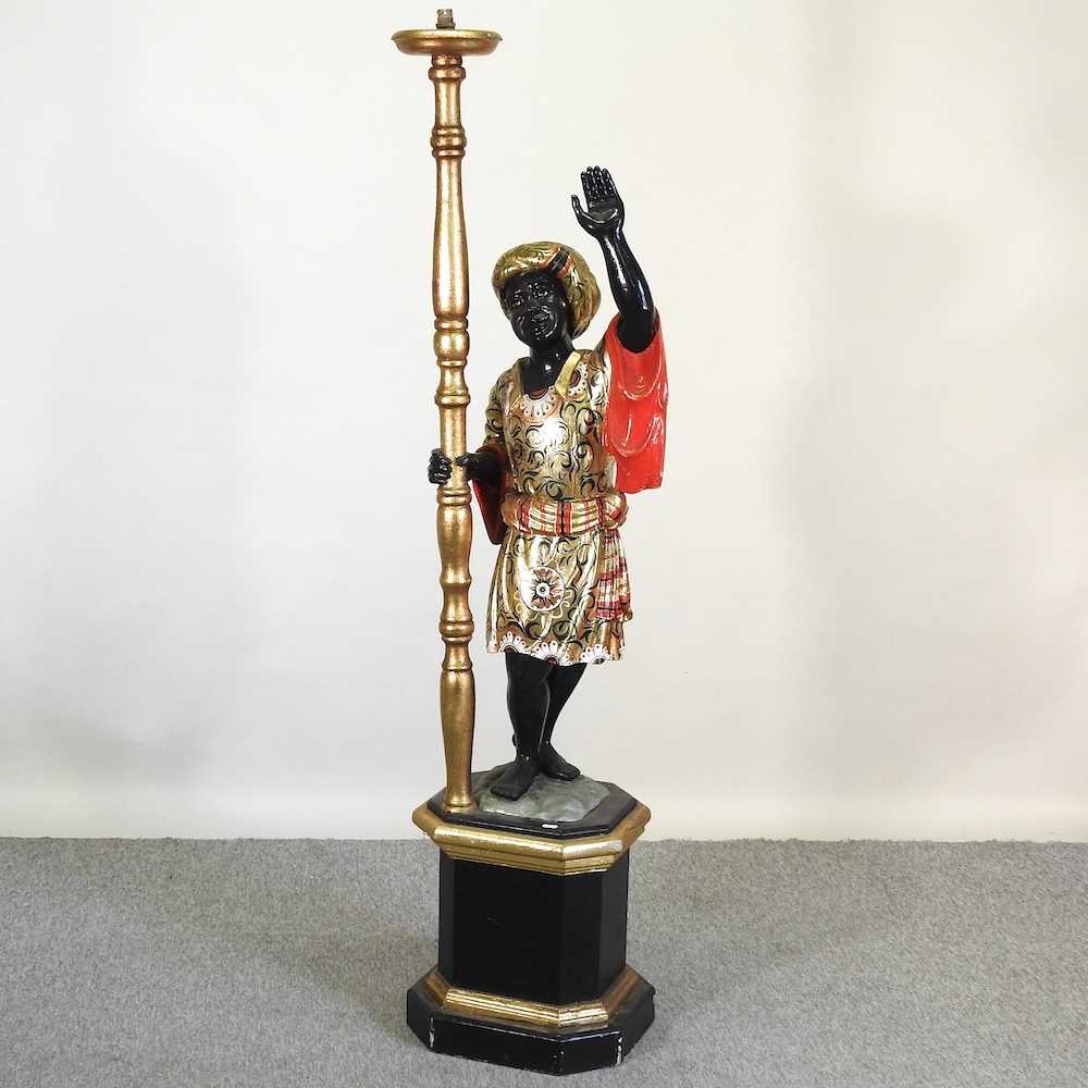 A large figural lamp