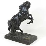 A bronze figure of a horse