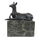 A bronze model of a goat