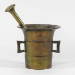 A bronze pestle and mortar