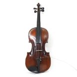 An antique violin and bow