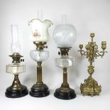 Three various oil lamps