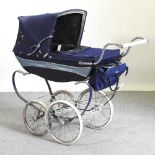 A silver cross pram