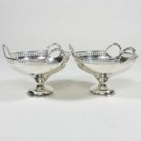 A pair of silver bon-bon dishes