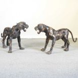 A pair of large bronze tigers