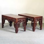 A pair of Chinese rosewood opium tables