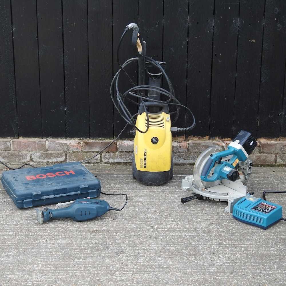 A pressure washer and tools