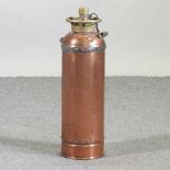 An antique copper fire extinguisher