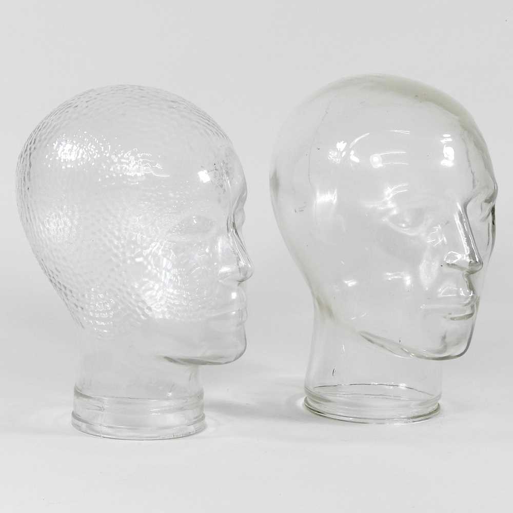 A glass mannequin head