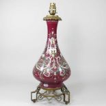 A 19th century continental pottery lamp