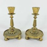 A pair of ormolu candlesticks