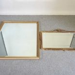 A gilt framed wall mirror