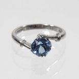 An 18 carat aquamarine and diamond ring