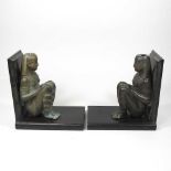 A pair of Egyptian style bookends