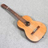 An early 20th century acoustic guitar