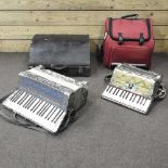A piano accordion and another