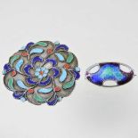 A Russian style silver and enamelled brooch