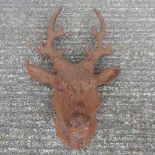 A cast iron stag head