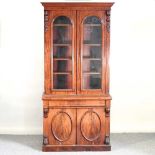 A Victorian cabinet bookcase